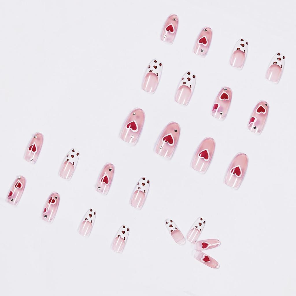 Ice-Transparent Nude Cow Print Love Heart False Nails - Waterproof, Removable, and Ready-to-Wear Nail Art Stickers.