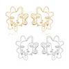 Trendsetting Alloy Face Earrings For Women Stylish And Modern Metal Ear Studs