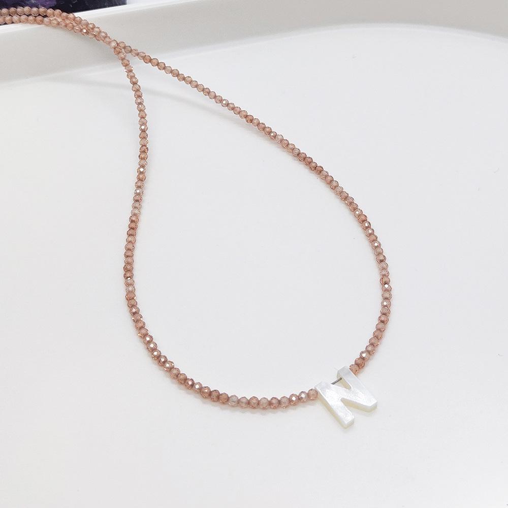 Elegant 2m Zircon Beaded Clavicle Chain: 26-Letter Deep Sea Shell Necklace for Women.