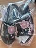 Hello Kitty Gal Shiatsu Slippers