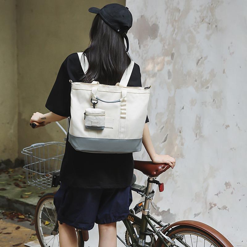 Backpack women's new women's large-capacity laptop bag men's and women's briefcase schoolbag commuter backpack