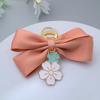 Niedlicher Sakura Fliege Schlüsselanhänger Mode Perlenkette Handtaschenanhänger Autoschlüsselanhänger Kopfhörerhülle DIY Ornament für Frauen Souvenir Schmuck