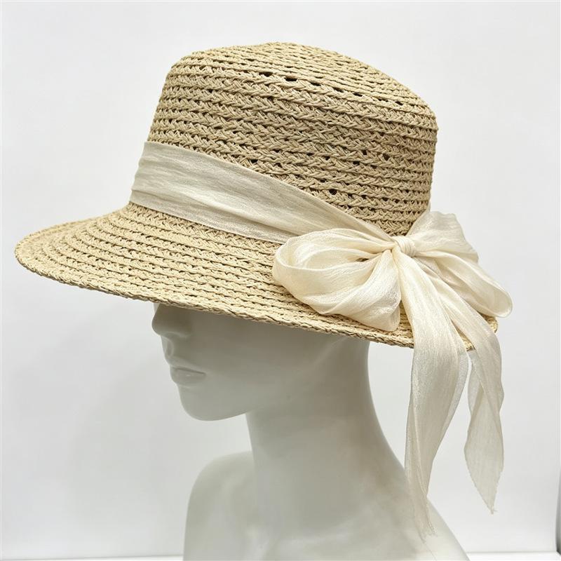 Hollow raffia simple webbing bow flat top hat women's summer elegant versatile sunscreen straw hat vacation beach hat