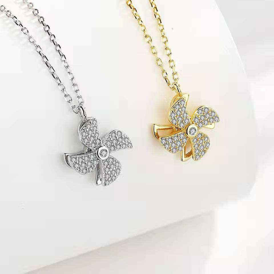Pinwheel Necklace: Rotatable Rhinestone Titanium Clavicle Pendant for Women