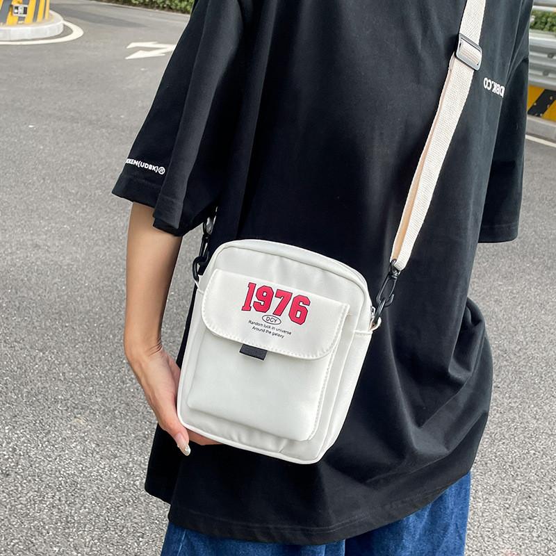 

Trendy Black And White Nylon Small Messenger Bag For Daily Use With Stylish Print білий