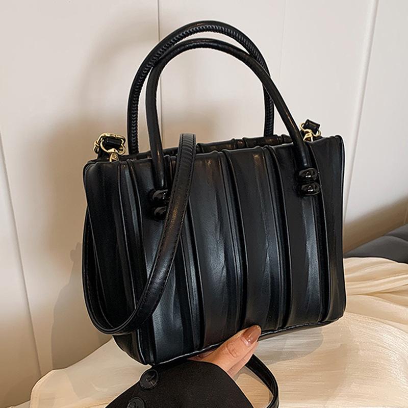 Korean version ins solid color pleated handbag bag women's 2025 autumn new foreign style casual one shoulder messenger tote bag