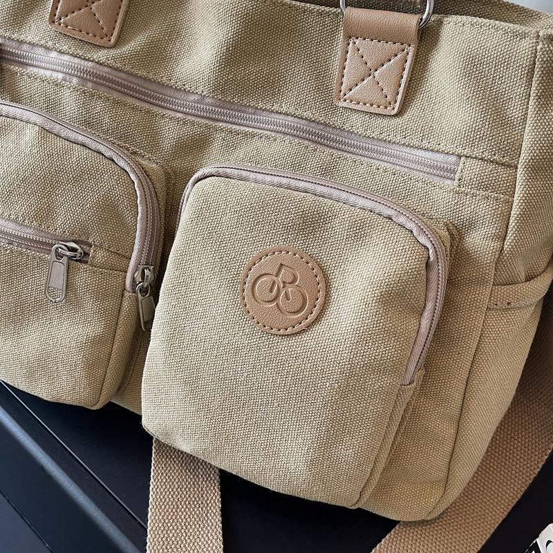 Stylish Canvas Shoulder Bag for Women, Multi-Pocket Tote with Adjustable Strap and Durable Design