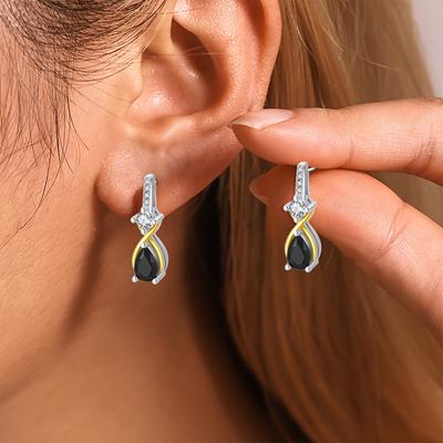 Orecchini a bottone con design in pietra nera