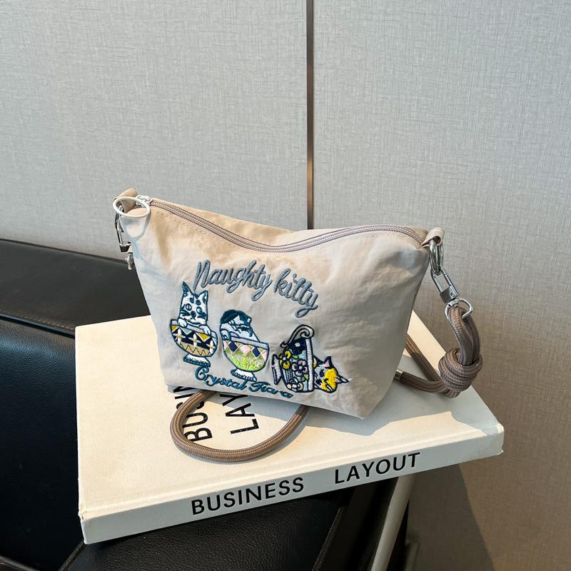 

2025 summer women s fashion casual simple portable shoulder oblique span embroidered canvas bag mobile phone zipper small square bag серый