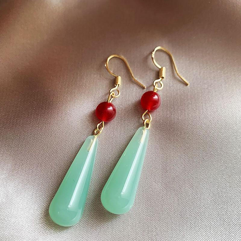 

Геометрические серьги в древнем стиле: Элегантный дизайн для женских аксессуаров к ципао