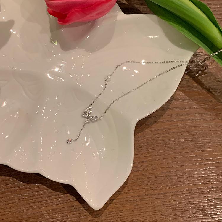 Korean Hot-Selling Long Tassel Bowknot Titanium Steel Necklace for Women: Light Luxury, Versatile, Exquisite Clavicle Chain