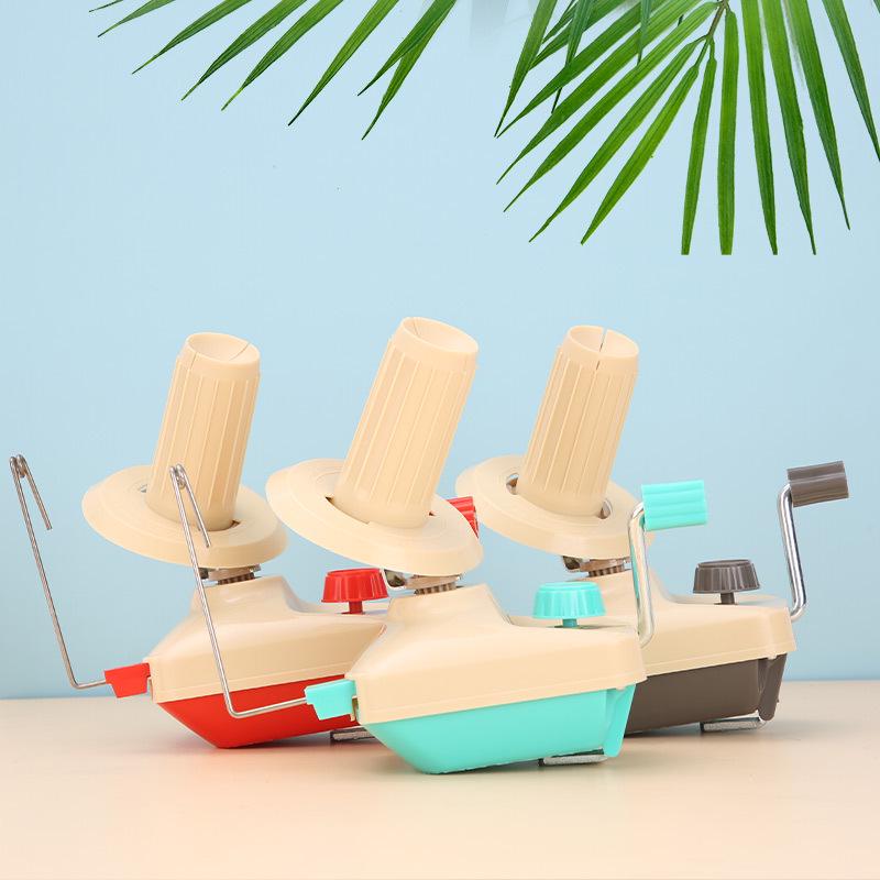 

Cyan Manual Yarn Winder: Portable Hand-Cranked Tool for DIY Knitting and Yarn Ball Making