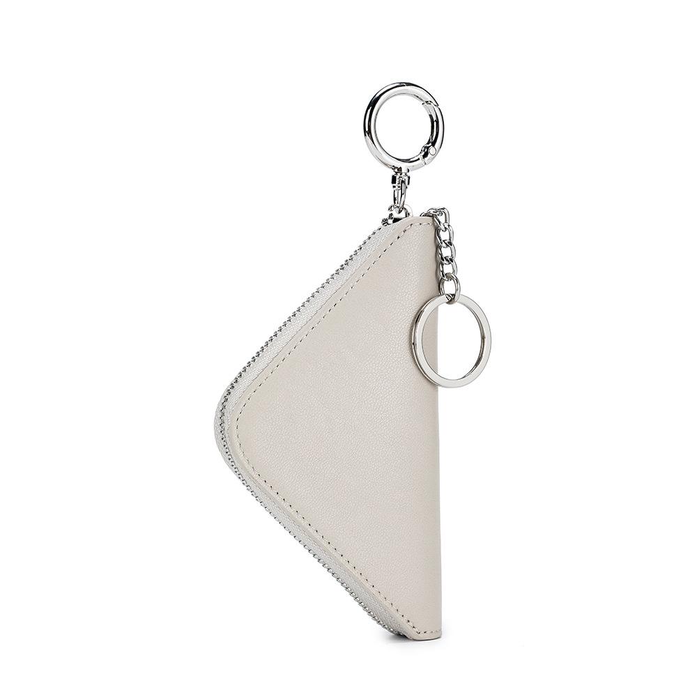 New high-end car key bag, lipstick bag, women's niche design, semi-vegetable tanned cowhide storage change bag