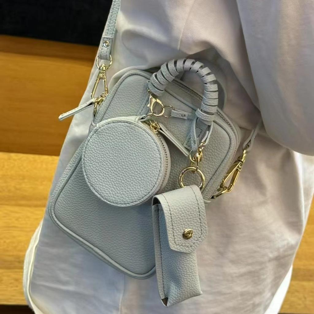 Spring and summer new women's bags niche design change mobile phone bag fashion versatile mini bag cowhide messenger bag