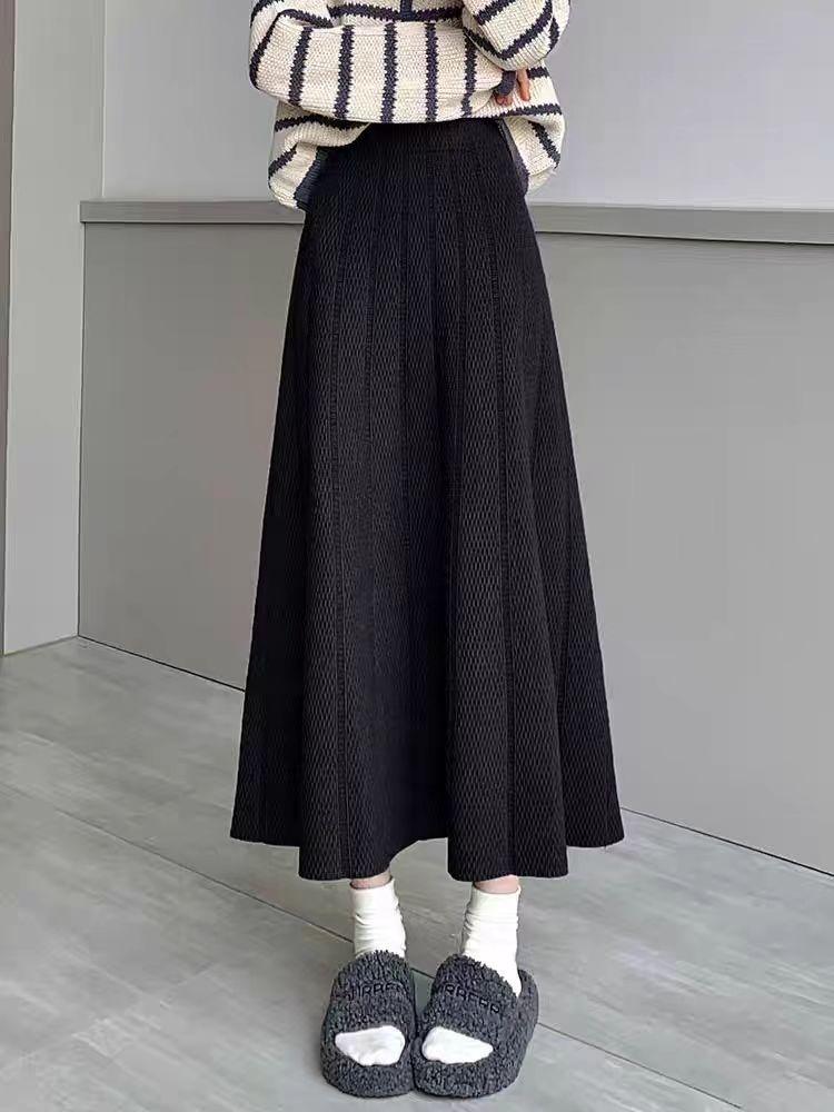 European, American autumn and winter new solid color elastic waist design sense texture medium and long versatile skirt foreign style knitted skirt