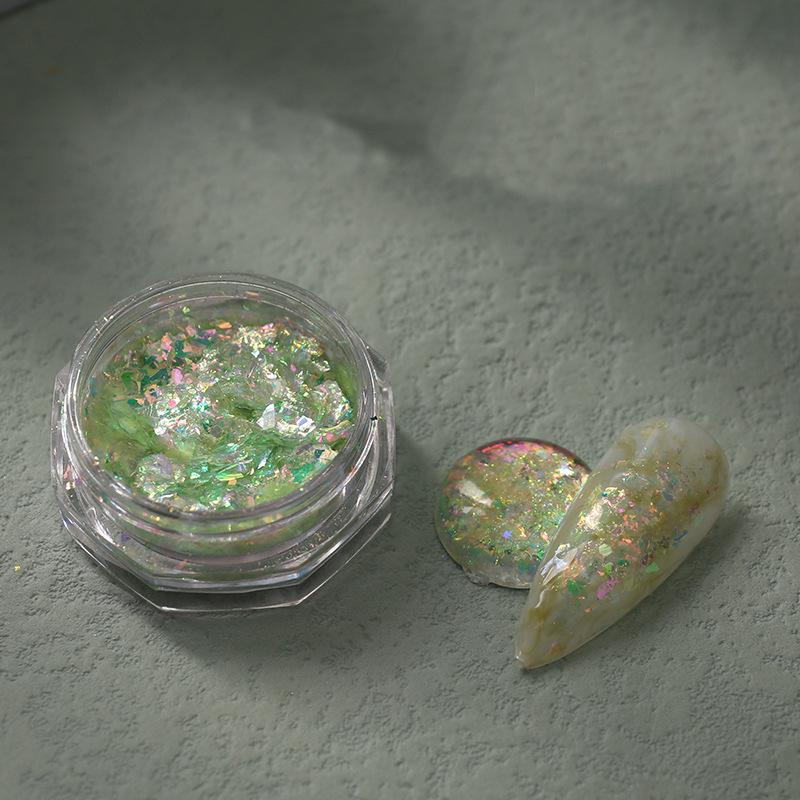 

Отбеливающая пудра Юнь Цзинь: Радужный летний гель для нейл-арта с фантазийным опаловым омбре-градиентом.