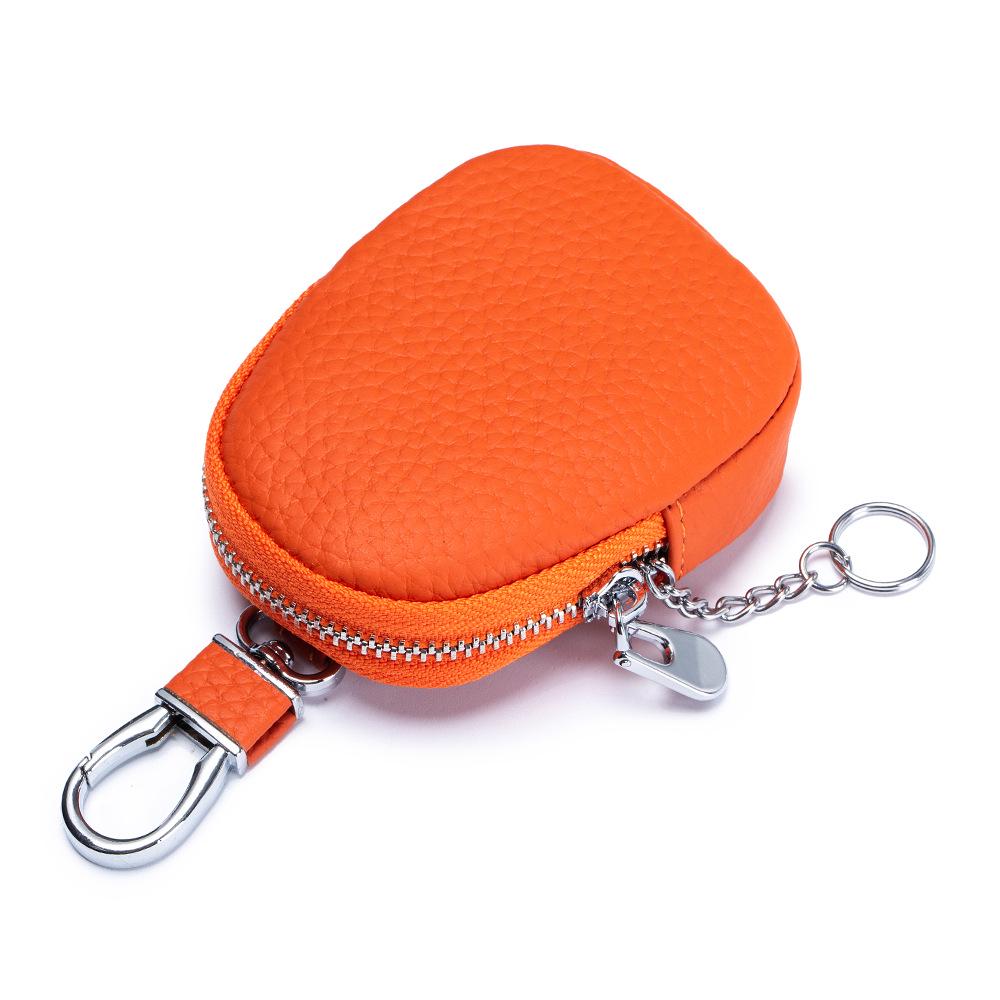 Genuine Leather Mini Coin Purse & Key Holder: Multifunctional Cowhide Wallet & Earphone Bag.