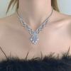 Elegant necklace, bracelet, and earring set - bridal jewelry with full diamond accents