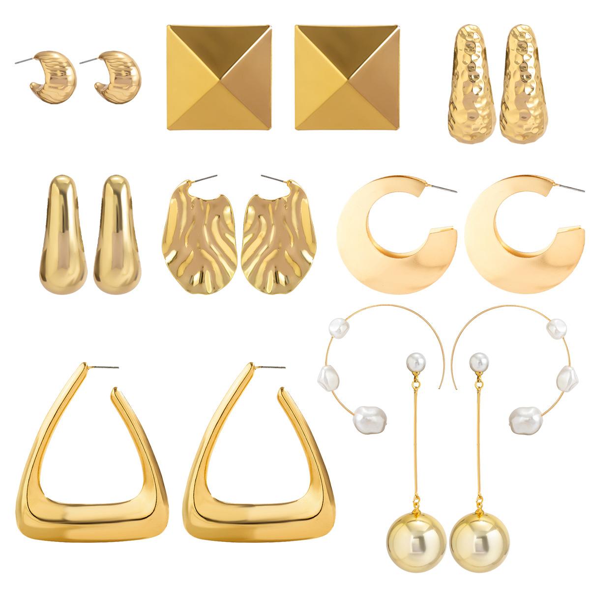 

Exaggerated personalized fringed pleated metal earrings, melon seed geometric imitation pearl stud earrings