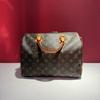 [Pre-Owned] Speedy 30 Iconic Design Rolled Handle Engraved Lock Detachable Adjustable Shoulder Strap Coated Canvas Smooth Leather - Very Good #1DZ6GFI