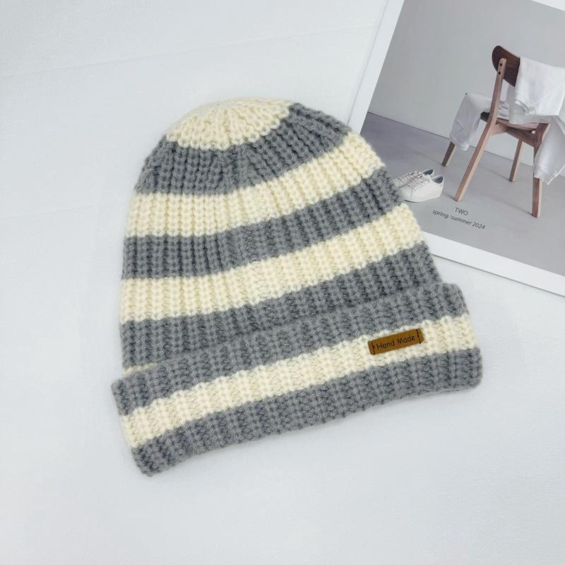 

Autumn and winter women s wool hat knitted hat two-color with classic versatile thermal ear protection street style show face idyllic style one size fits all