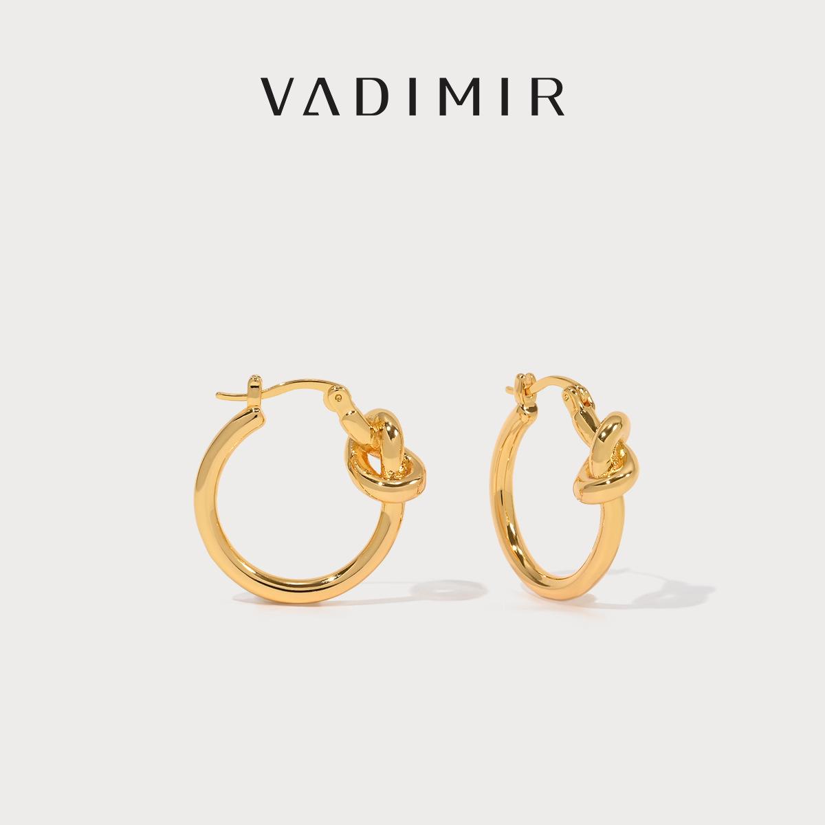

Zhang Zifeng star gold circle knot earrings women s new niche light luxury high-end earrings