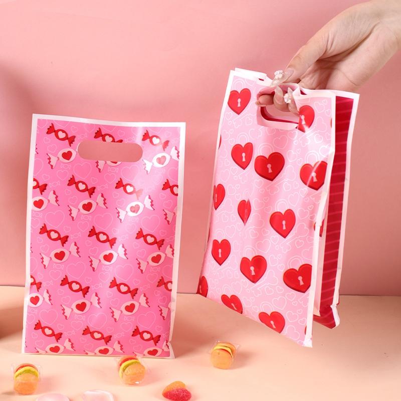 50pcs Pink Heart Valentine's Day Plastic Gift Bags Candy Bags For Valentine's Day Party Favor Wedding Decor And Party Suppllies