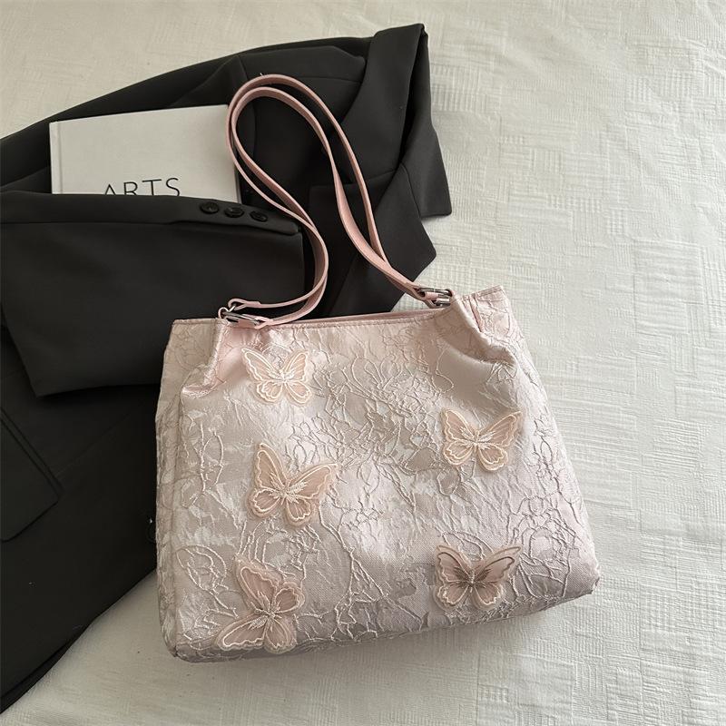 

Повседневная простая нишевая сумка большой вместимости 2025 весна новый иностранный стиль модный тренд текстура женская сумка через плечо розовый