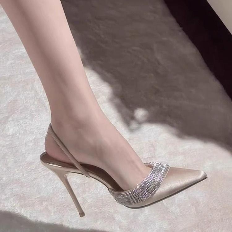 

2025 spring and summer pointed champagne high heels women s light mouth rhinestone half slippers one word with satin bag head sandals 35