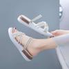 Two women wearing sandals in the summer of 2025, the new sports mid-heel wedge heel muffin thick-soled Roman pregnant women's flat-soled women's shoes