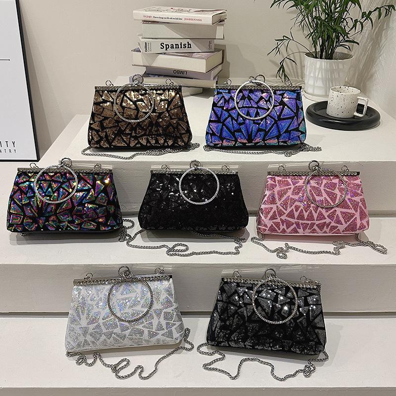 Geantă rotundă cu închidere de mână din paiete pentru cină