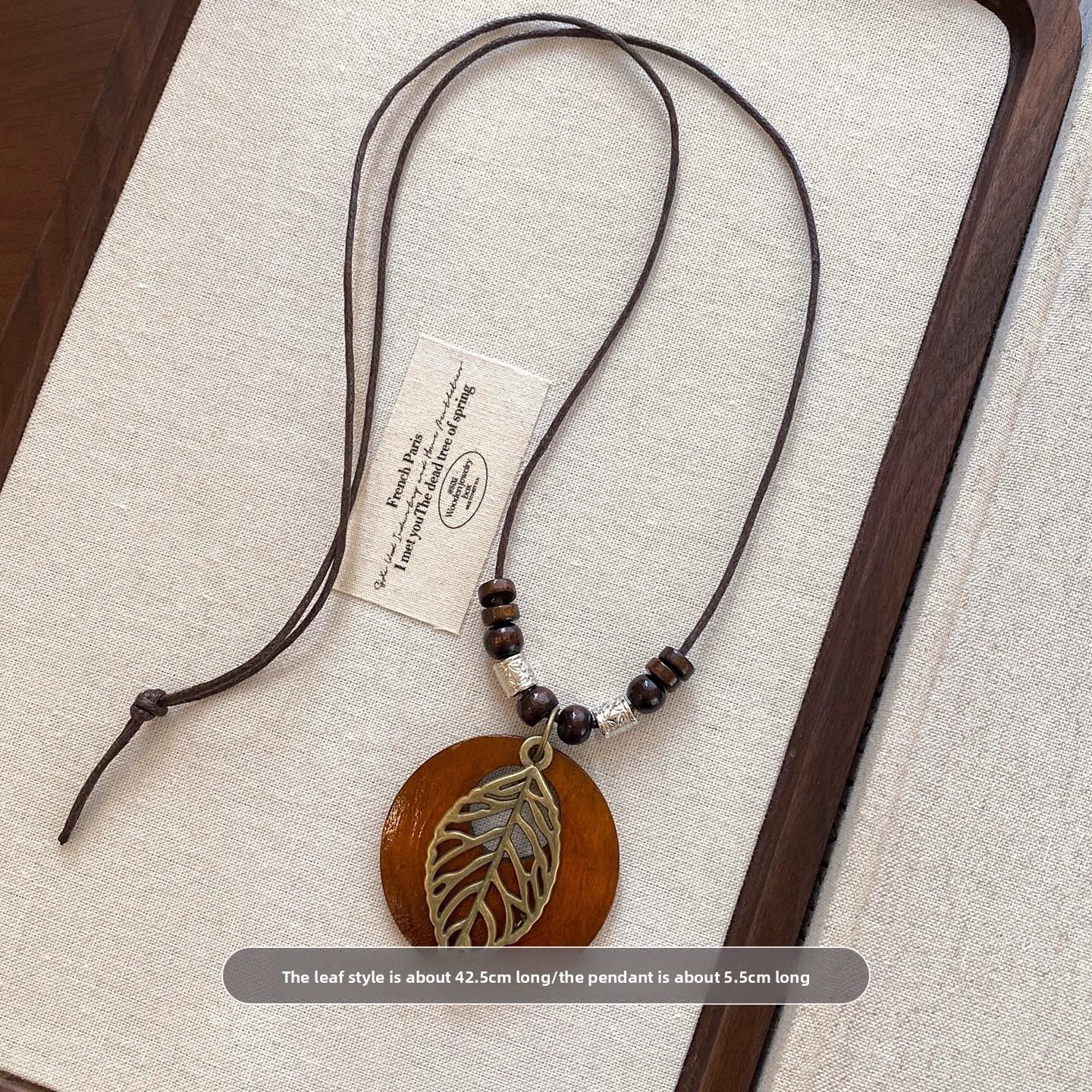 New Chinese Style Women s Retro Chinese Style Long Pendant Sweater Circular Necklace Round wood leaves