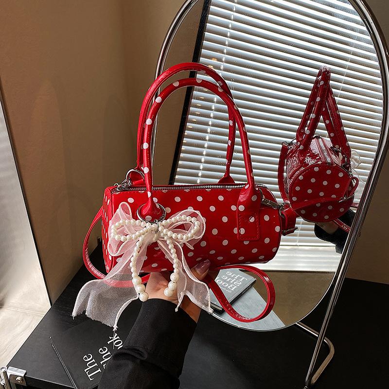 Niche polka dot bag 2025 new Mori sweet fashion bow foreign style versatile portable shoulder cylinder bag