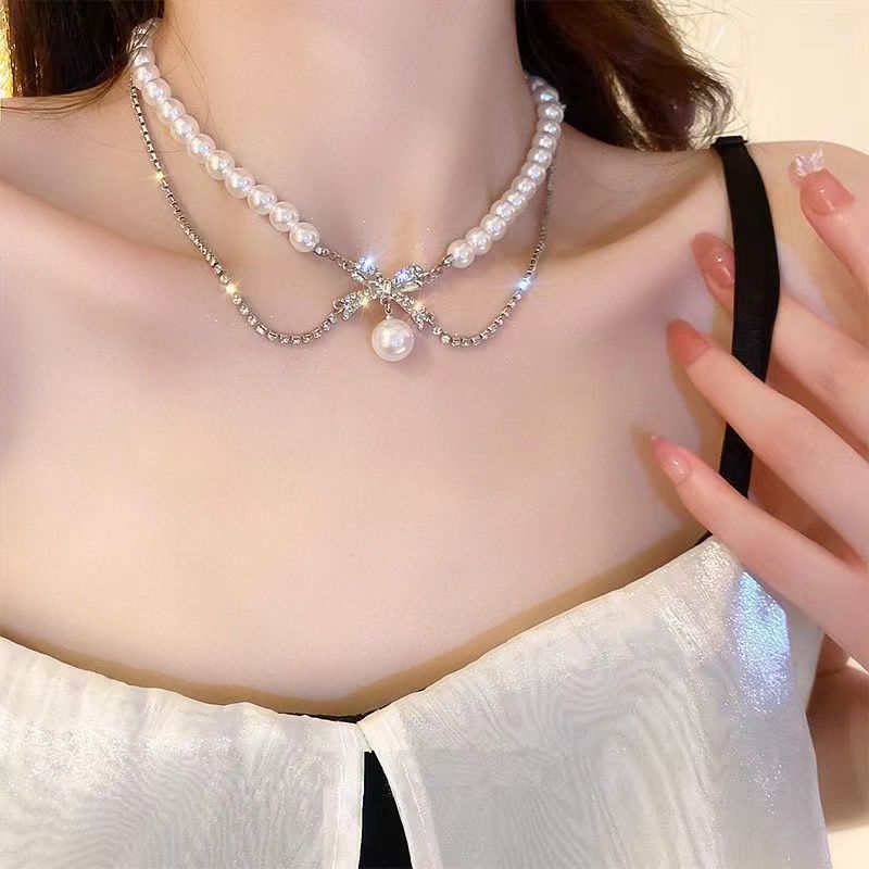 Versatile Necklace Female Niche Design Sense Light Luxury Collarbone Chain Bow Neck Chain Girlfriend Pendant Accessories