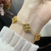 Pulsera de trébol de cuatro hojas para mujer, estilo palacio retro, lujo accesible, moda elegante.