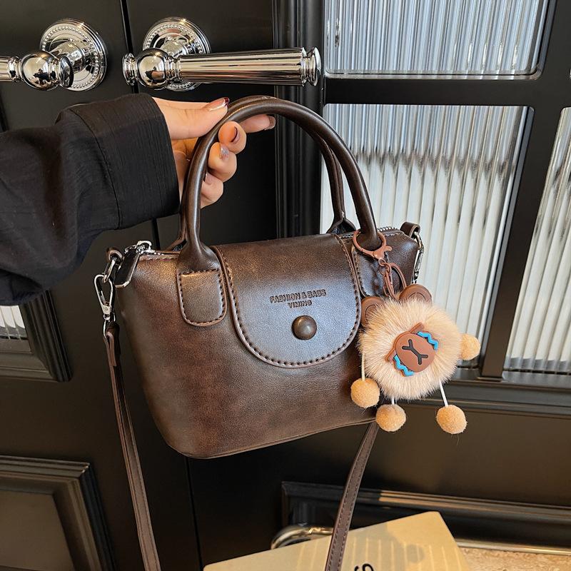 

This year s popular bags women s 2025 new fashion messenger dumpling bags versatile casual shoulder bags handbags темно-коричневого