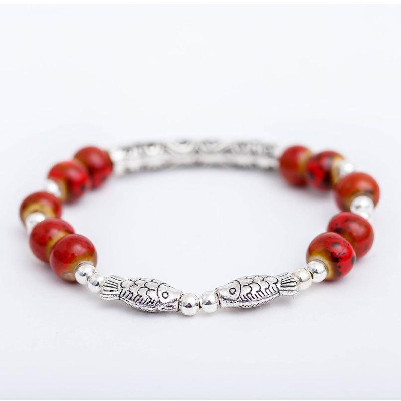 

Винтажный керамический женский браслет, милая и свежая рыбка, ручной работы тибетское серебро полый браслет, парные аксессуары