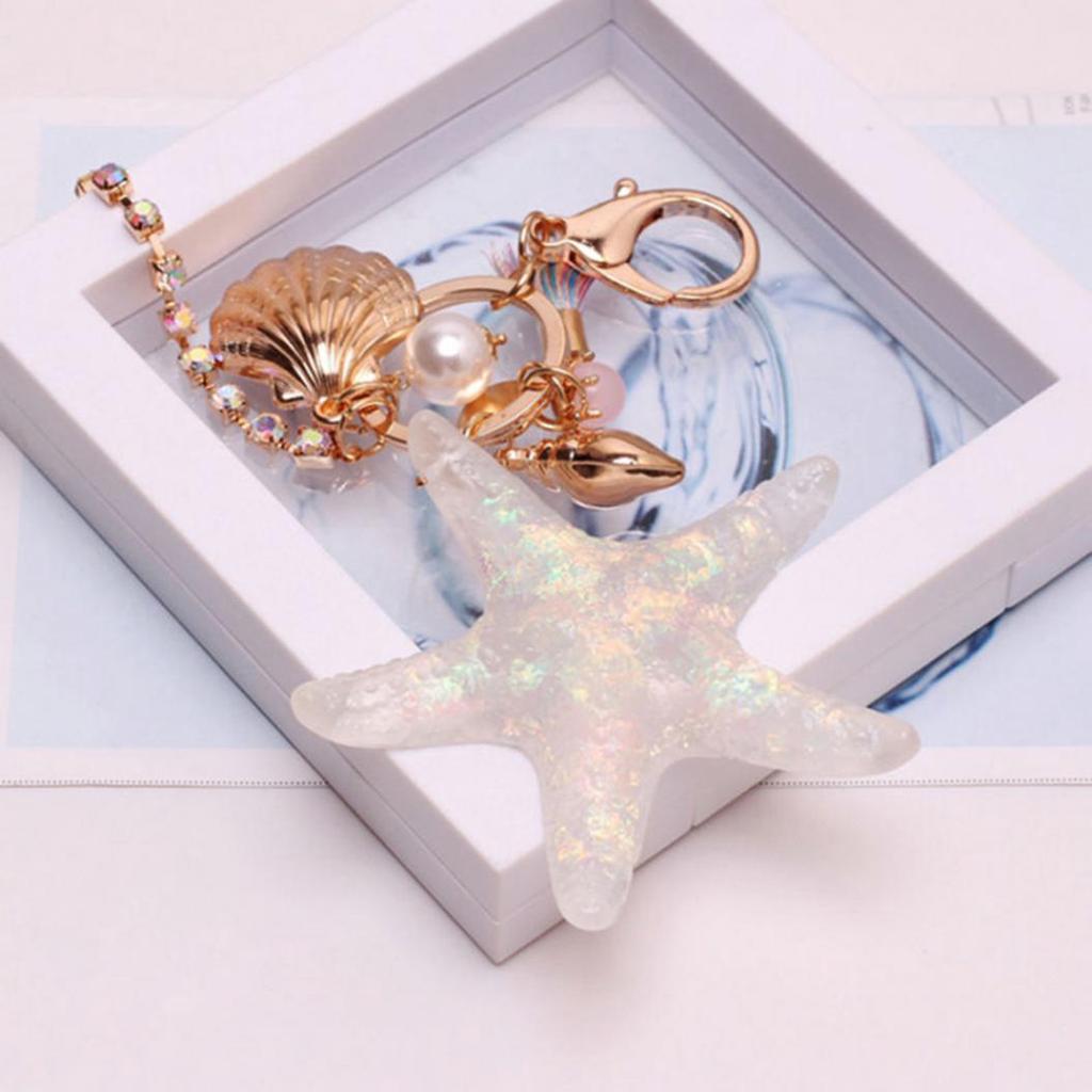 Söt sjöstjärna snäcka vinkelsnäcka tofs hänge nyckelring kvinnor nyckelring