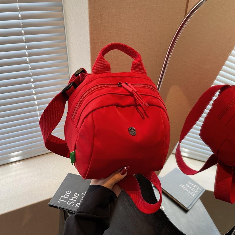 

Canvas bag women s new trend fashion high-end handbag commuter shoulder crossbody shell bag бордовый