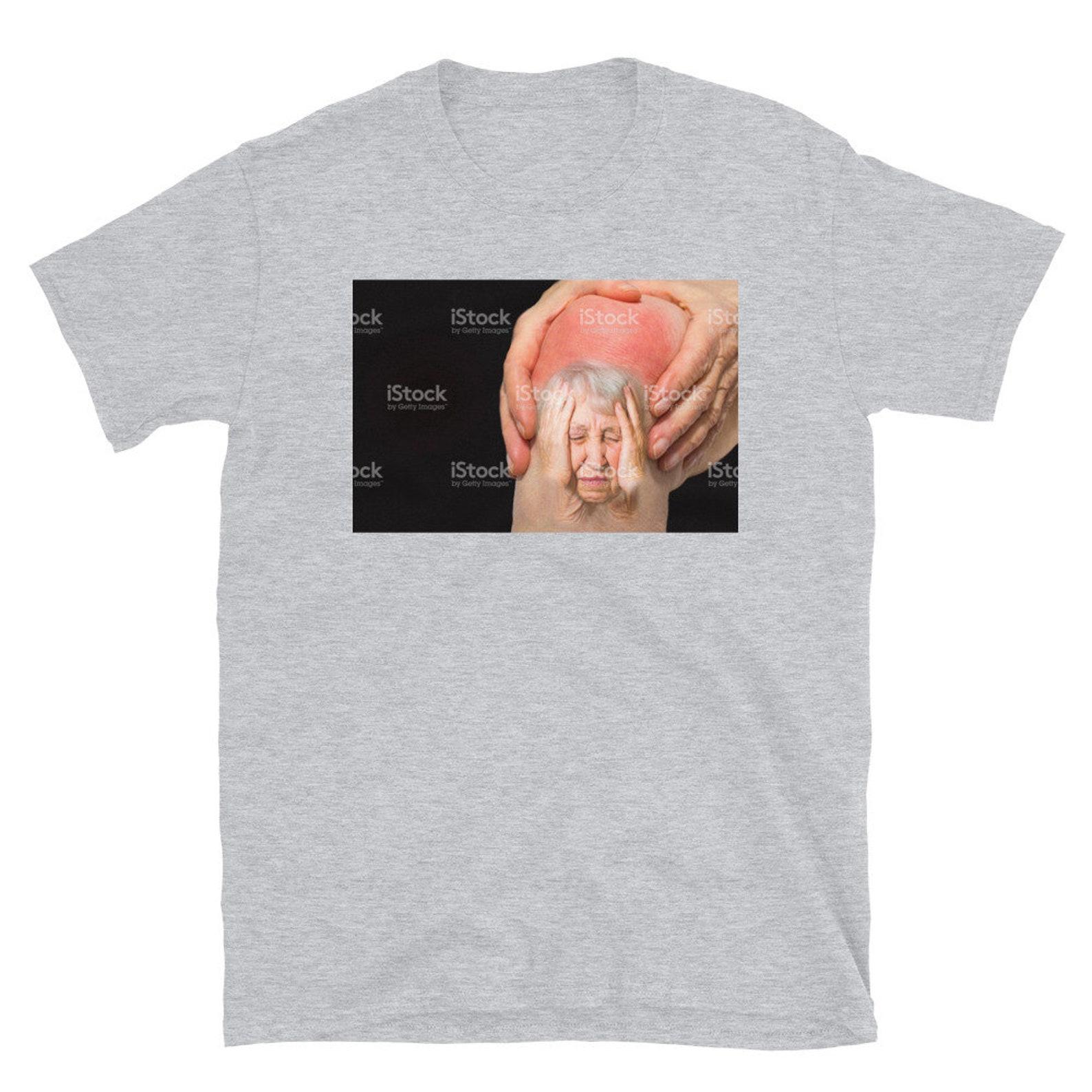 stock image of senior woman holding the knee with pain T-Shirt 4XL