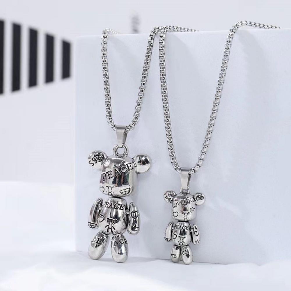 La marée dynamique des ours arrive ! Collier avec pendentif coulissant, chaîne de pull hip-hop punk pour couple, bijoux tendance pour femmes en gros