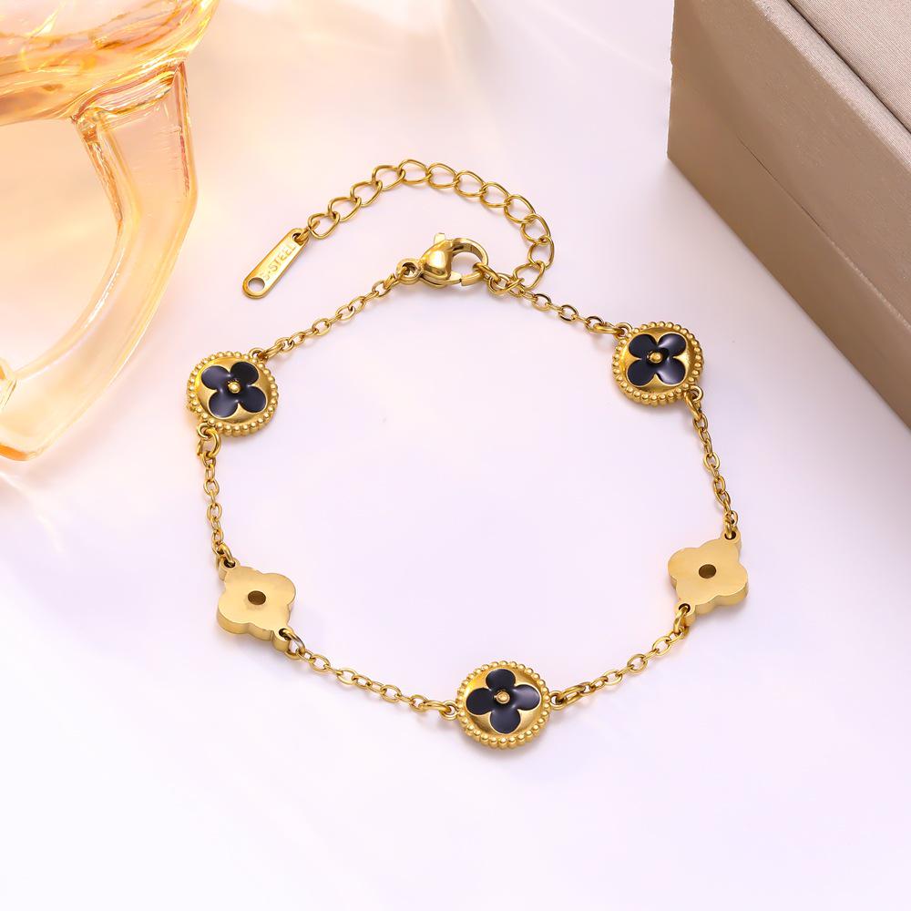 Titanium Steel Mother-of-Pearl Four-Leaf Clover Bracelet for Women: Elegant, Versatile, Lightweight Luxurious Jewelry.