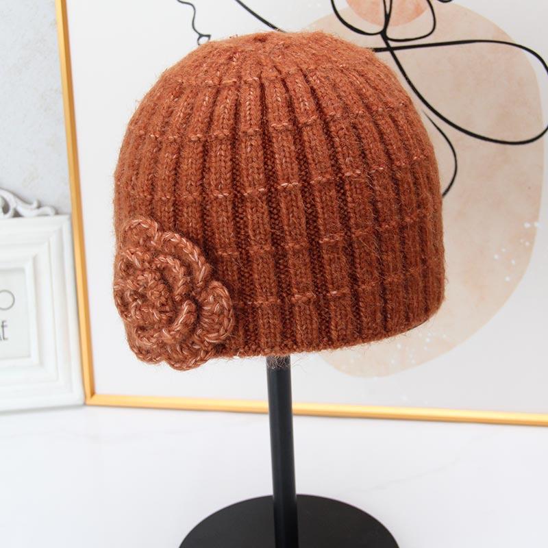 Three-dimensional flower knitted headgear women's autumn and winter face small warm windproof cold hat ear protector wool hat pullover hat