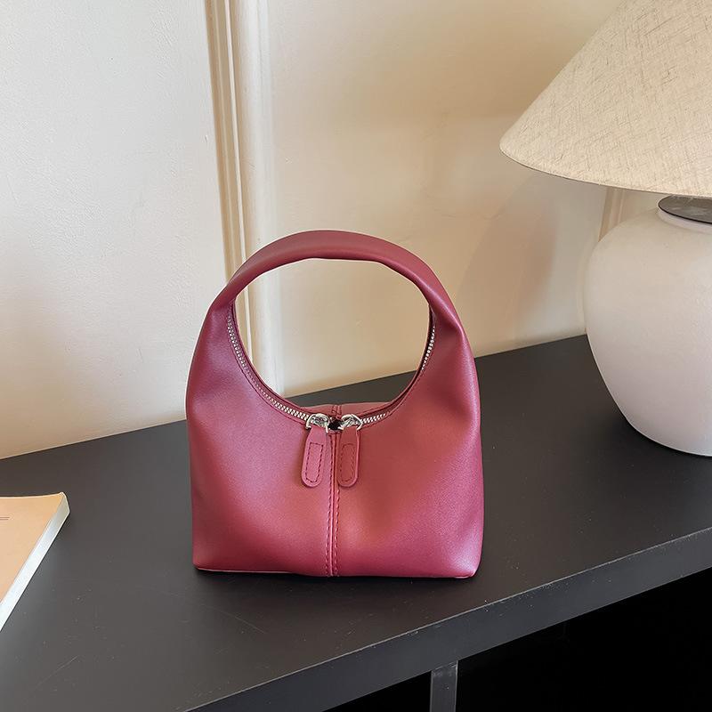 New women's bags on the bag, new trendy and foreign versatile shoulder bags, large-capacity handbags, mini messenger bags.