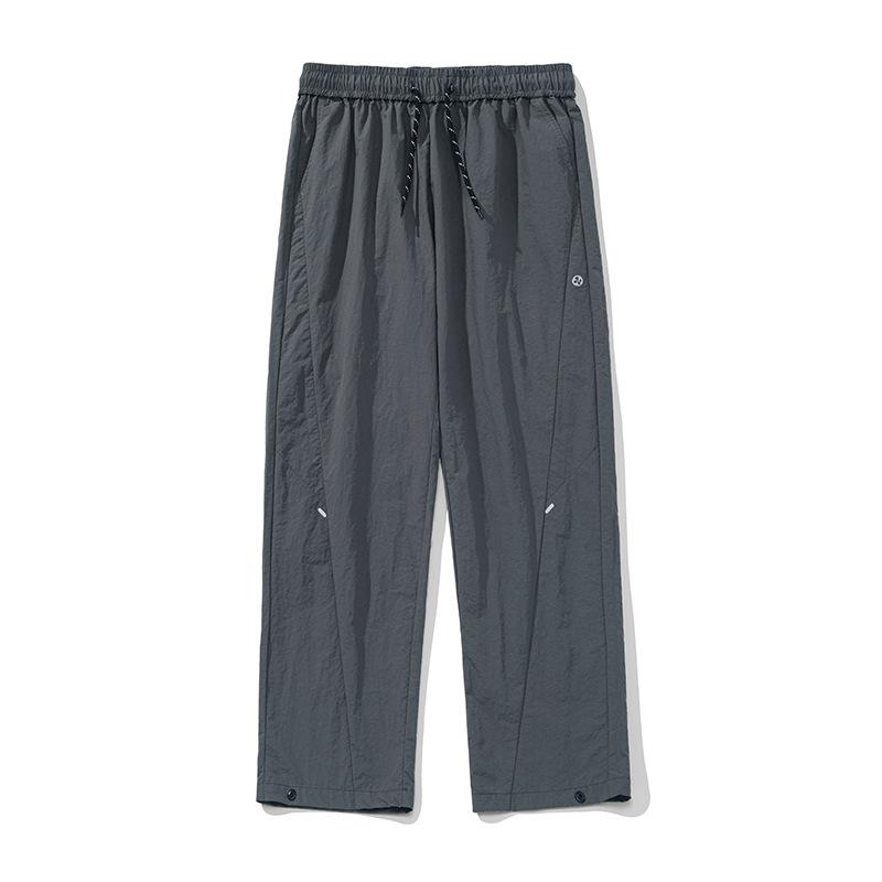 Outdoor tooling casual pants men's new anti-splashing split design long pants four-in-one buckle adjustment charging pants