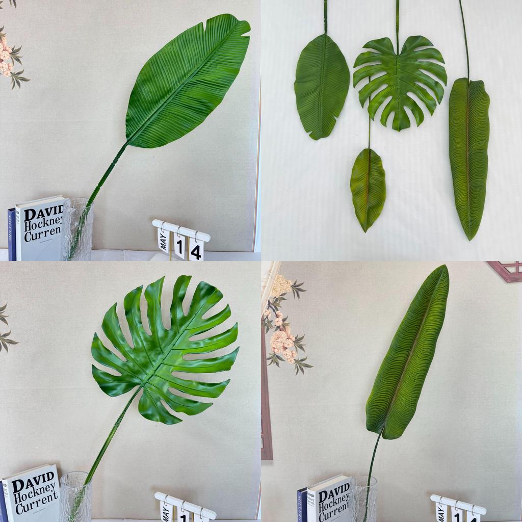 Dekoration i form av en falsk bananbladsfläkt för bröllop och heminredning