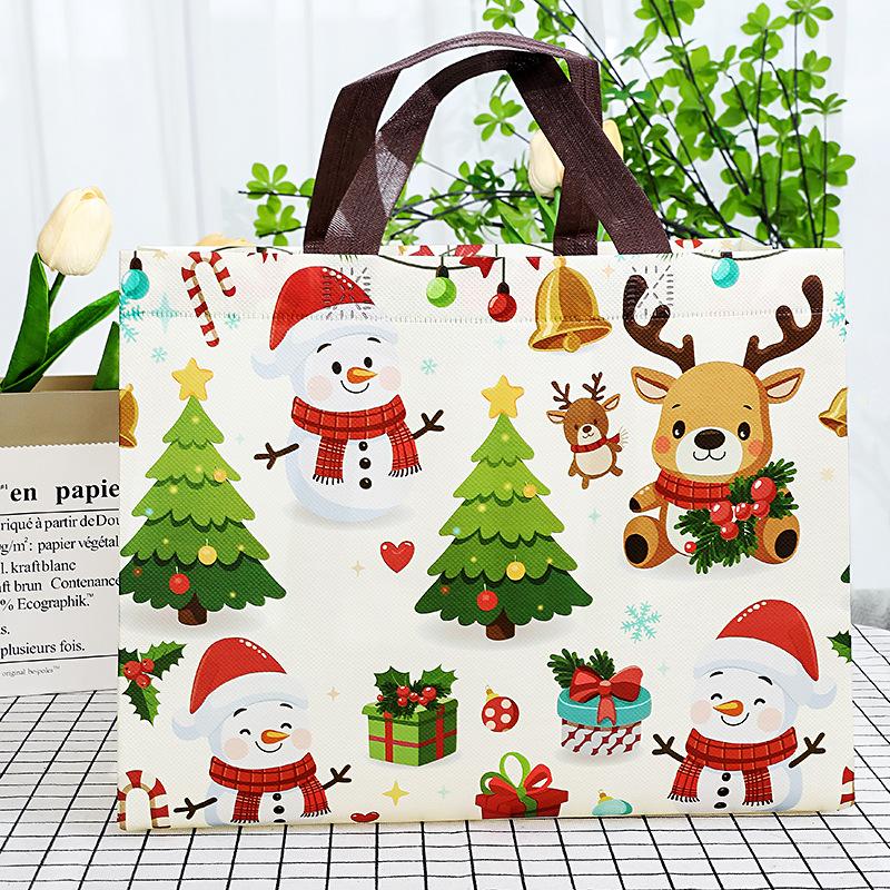 

1 шт. Большие подарочные пакеты на Рождество с ручками, многоразовые, с рисунками Санты, снеговика, рождественской елки - для праздничного шопинга, рождественских вечеринок
