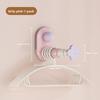 Stretchable Hanger Storage Rack - A Household Hanger Storage Solution That Uses Suction Cups and Doesn't Require Drilling Holes.