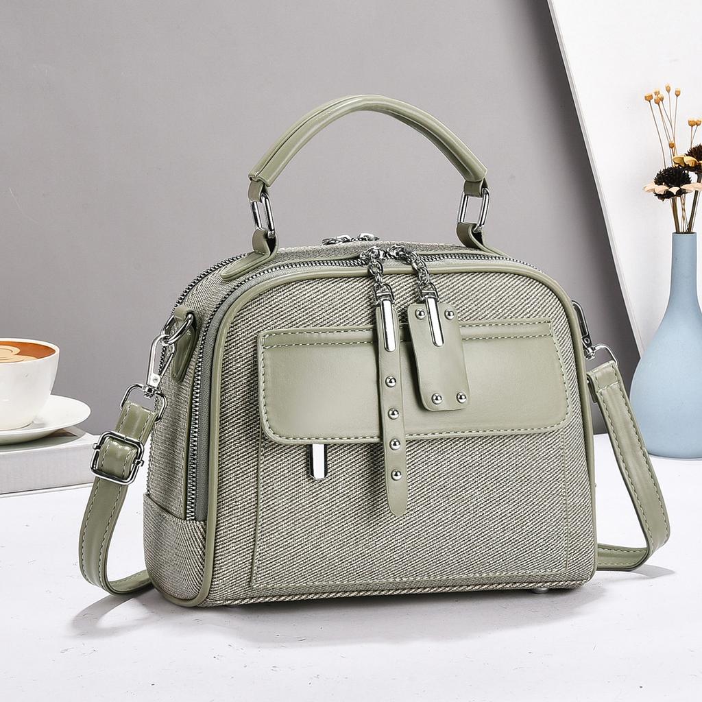 New High Appearance Level Canvas Texture Fashion Trend Handbag Senior Sense Splicing Shoulder Bag Large Capacity Tide