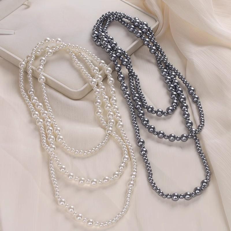 Hepburn style long stacked pearl necklace women's sweater chain temperament advanced sense light luxury niche 2025 new explosion